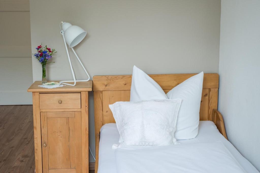 Postel nebo postele na pokoji v ubytování Wailtl Hotel
