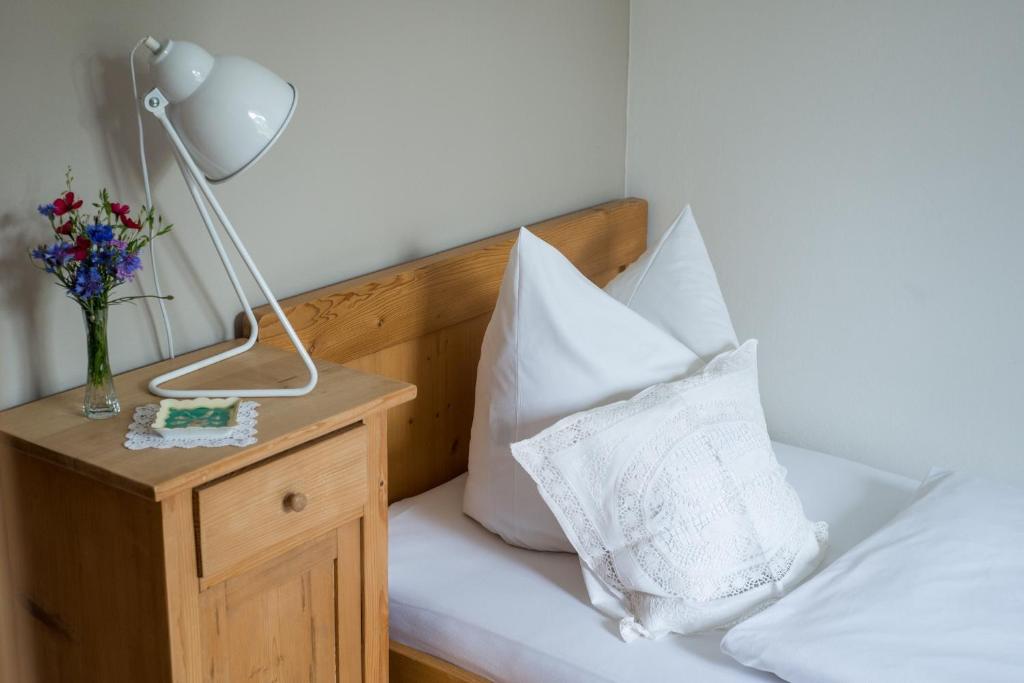 Postel nebo postele na pokoji v ubytování Wailtl Hotel