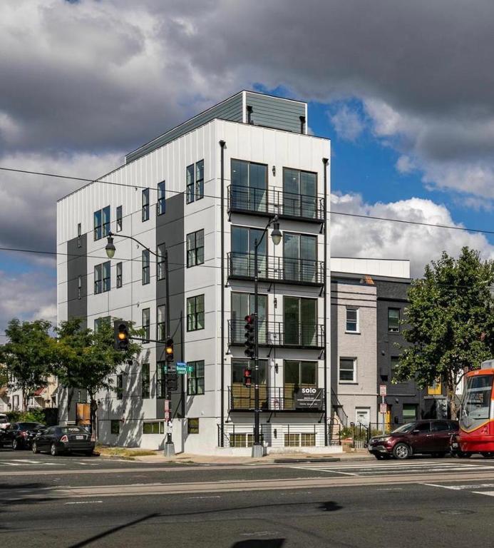 Hotel Mary's Stay H St Corridor, a white building on the corner of a street at Mary's Stay H St Corridor in Washington, D.C.