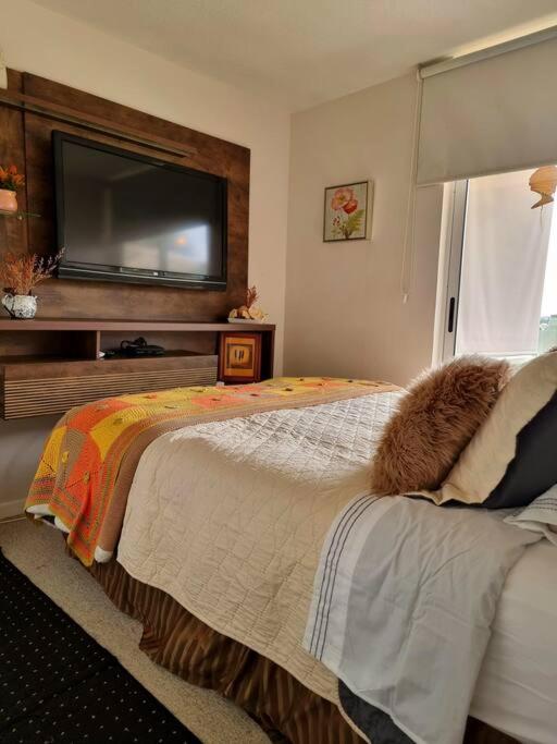 Postel nebo postele na pokoji v ubytování Deptomar307 Condominio Miramar El Tabito