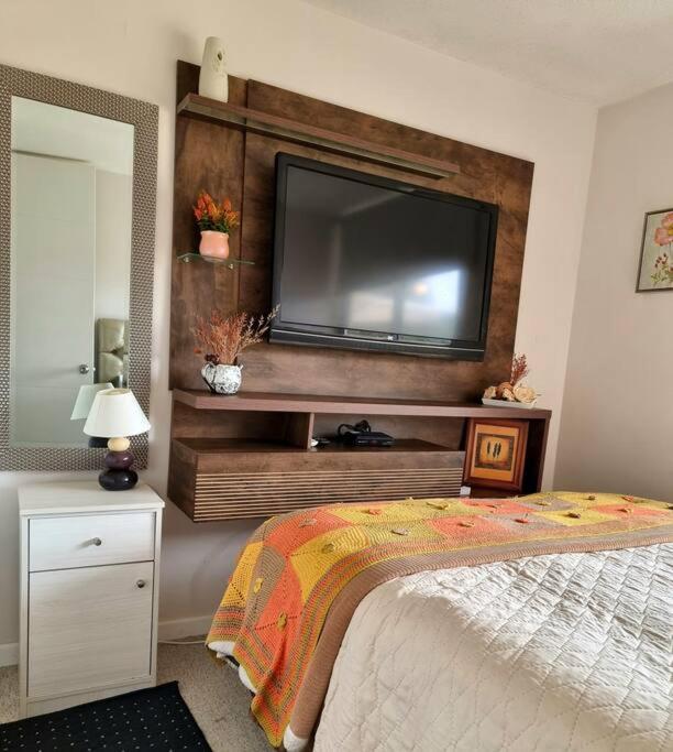 Postel nebo postele na pokoji v ubytování Deptomar307 Condominio Miramar El Tabito