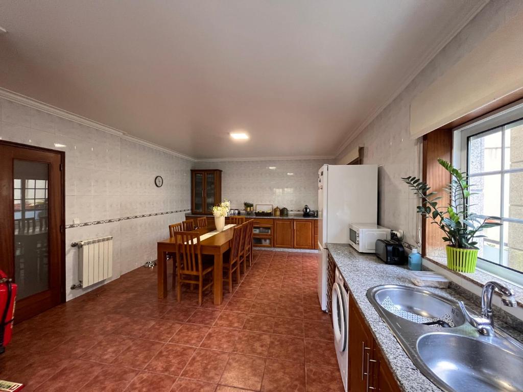 Kuchyň nebo kuchyňský kout v ubytování AM Residence