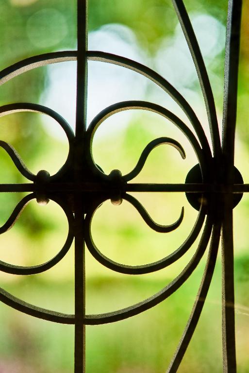 a close up of a glass door with a window at Secret Garden Apartment Center Opatija with private parking space in Opatija