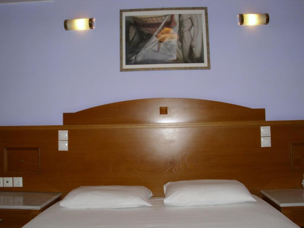 Posteľ alebo postele v izbe v ubytovaní Hotel Cybele Pefki