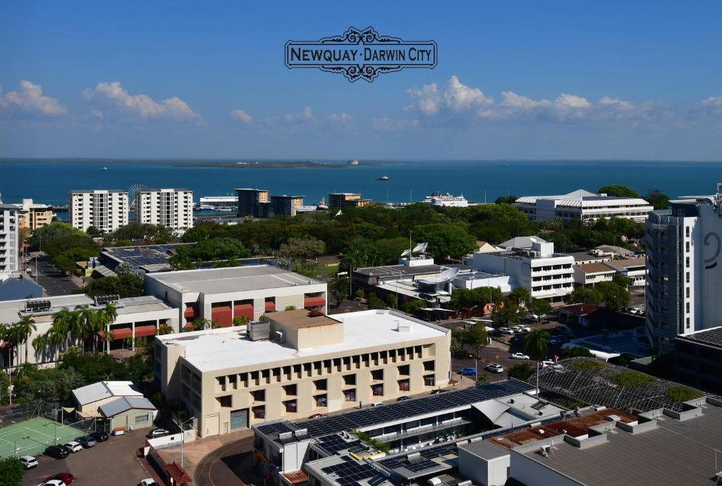 an aerial view of a city with buildings and the ocean at "NEWQUAY" Ideal Location & Views at PenthousePads in Darwin