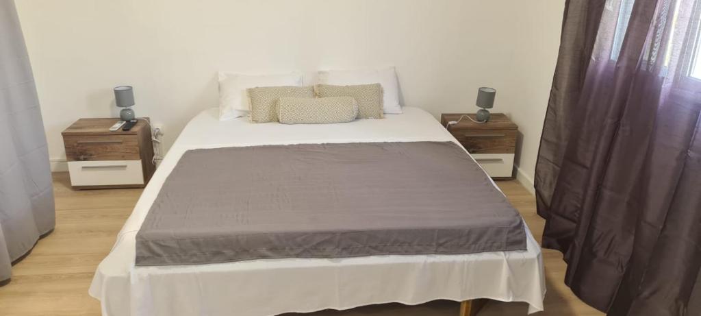 Posteľ alebo postele v izbe v ubytovaní Paradies Caraibes IV