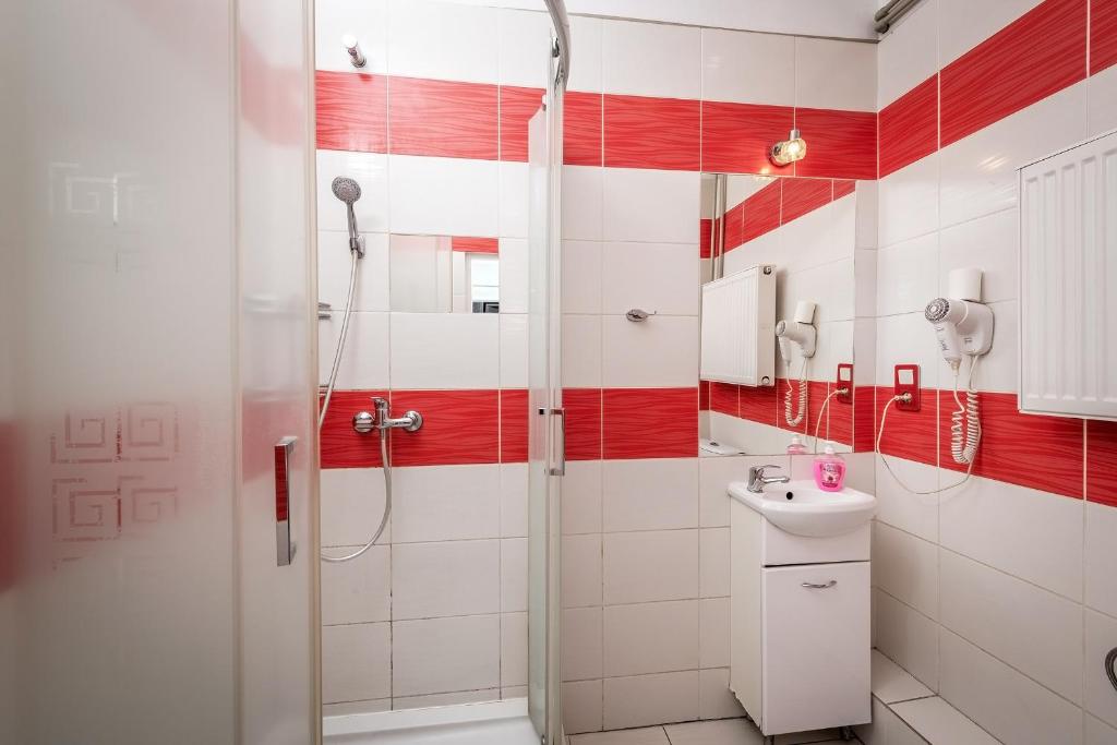 Kúpeľňa v ubytovaní Queen Apartments