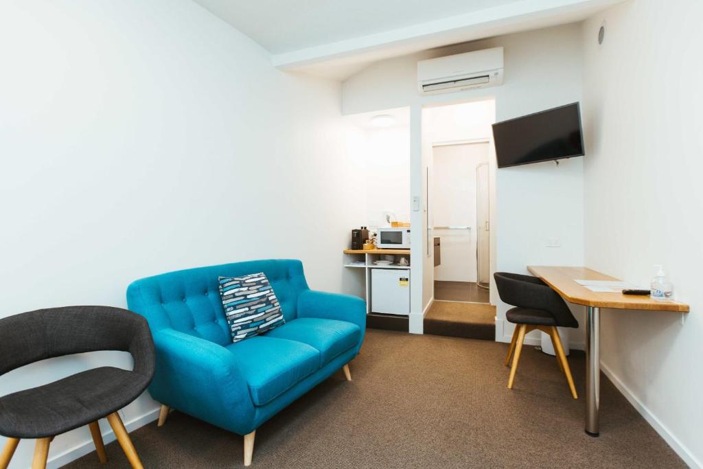 TV a/nebo společenská místnost v ubytování Salamanca Galleria Apartments