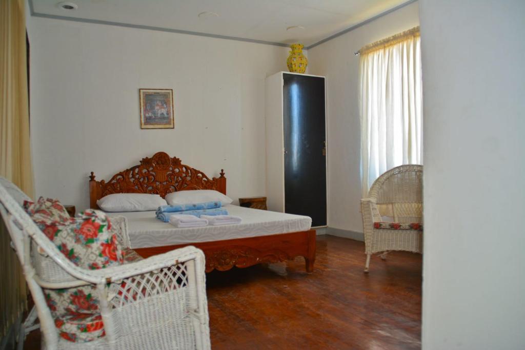Postel nebo postele na pokoji v ubytování Isla Bonita Beach Resort