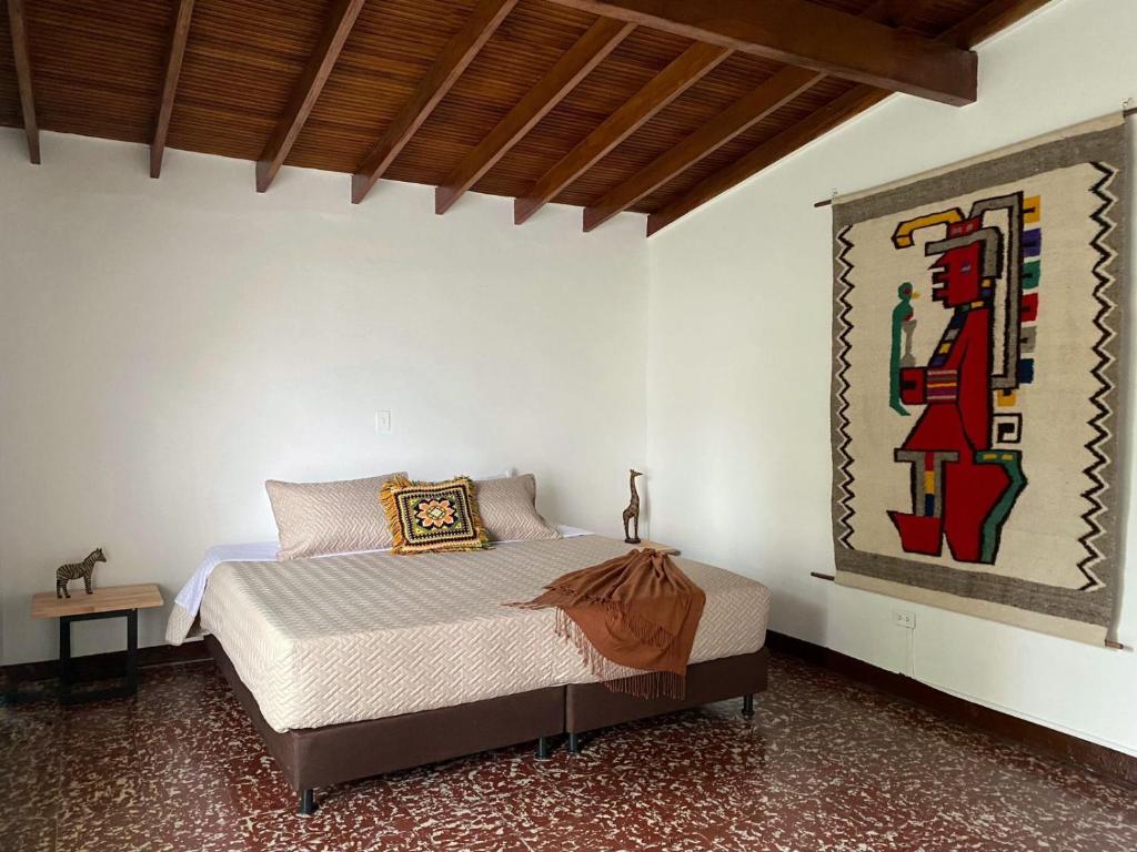 Posteľ alebo postele v izbe v ubytovaní Casa Botero, Alojamiento Completo