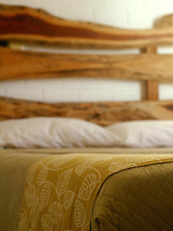 Postel nebo postele na pokoji v ubytování Tropic Bacalar