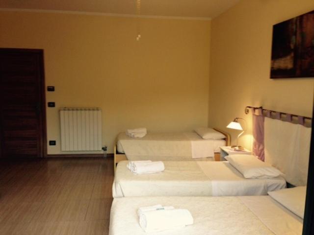 Postel nebo postele na pokoji v ubytování B&B Marzia