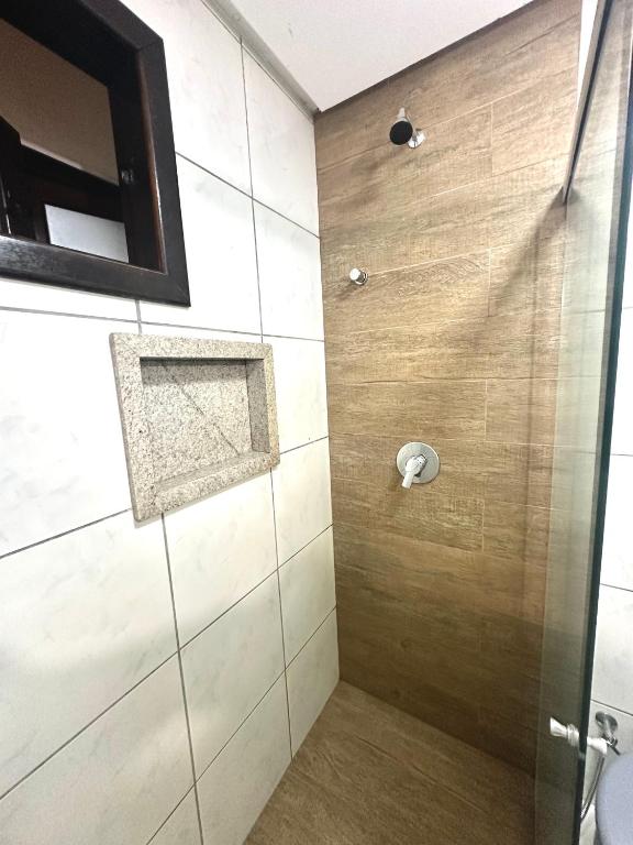 Um banheiro em Hotel Bem Brasil