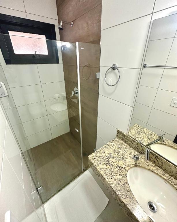 Um banheiro em Hotel Bem Brasil