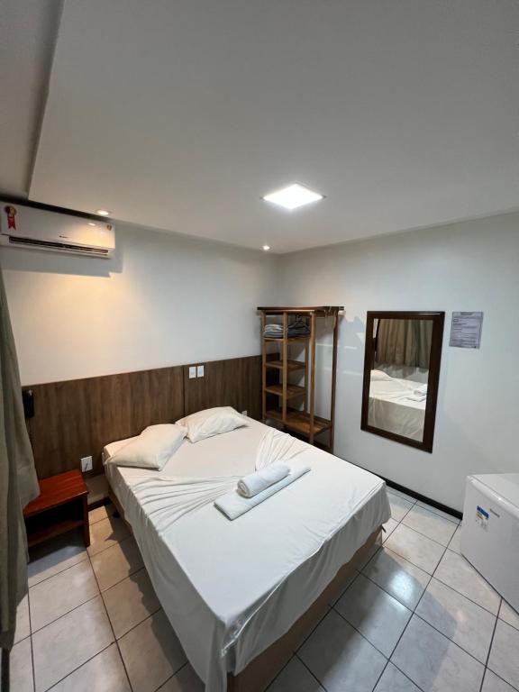 Cama ou camas em um quarto em Hotel Bem Brasil