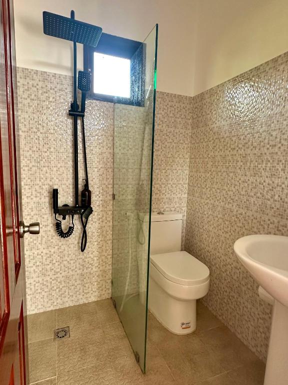 Koupelna v ubytování Haven Suites Siargao