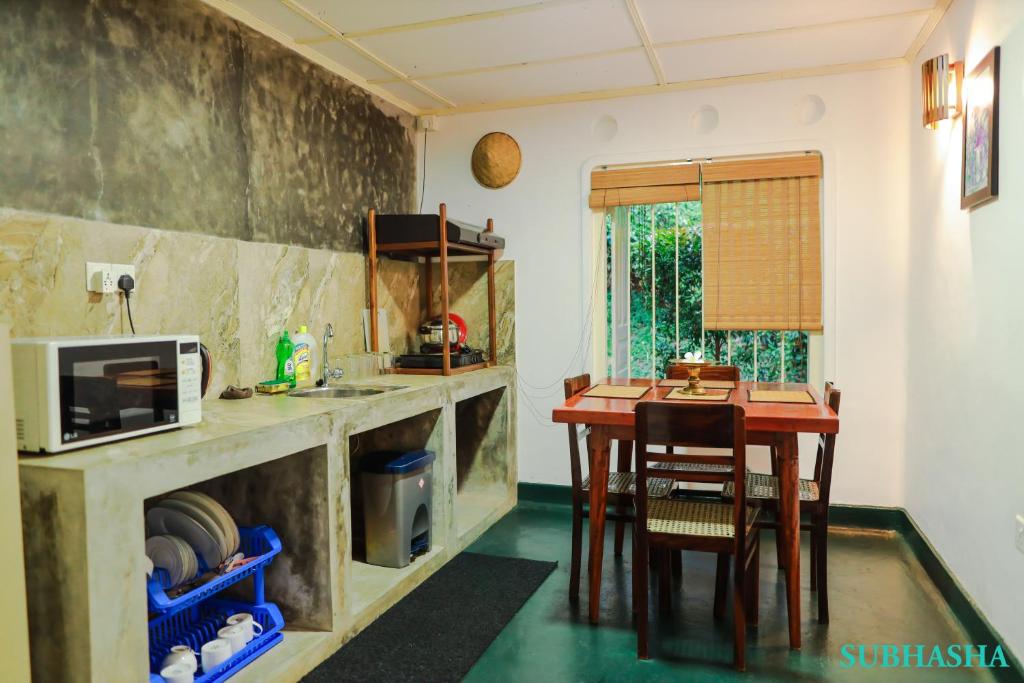 Kuchyň nebo kuchyňský kout v ubytování Subhasha Summer House