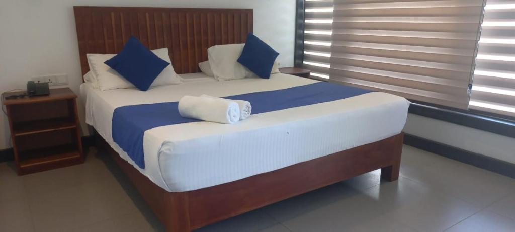 Postel nebo postele na pokoji v ubytování J7 Villaj Resort