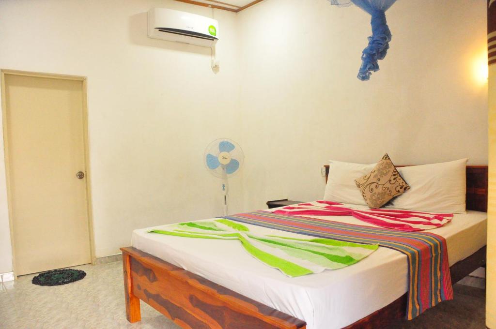 Postel nebo postele na pokoji v ubytování Horizon Resort & Hostel Sigiriya