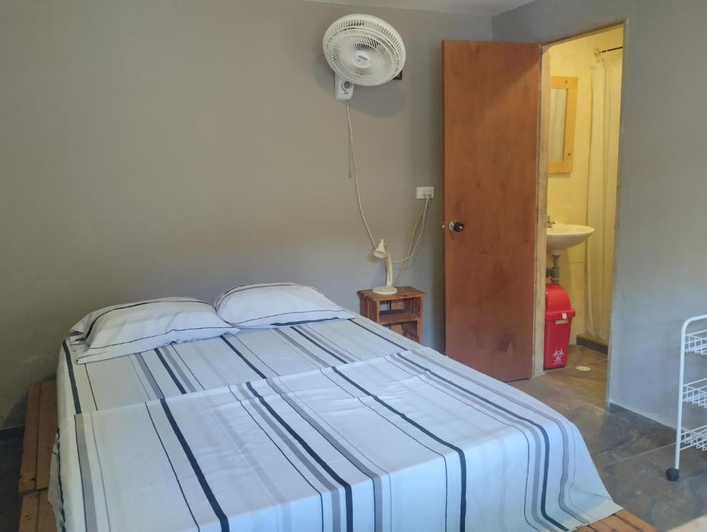 Postel nebo postele na pokoji v ubytování Hermoso Palomino