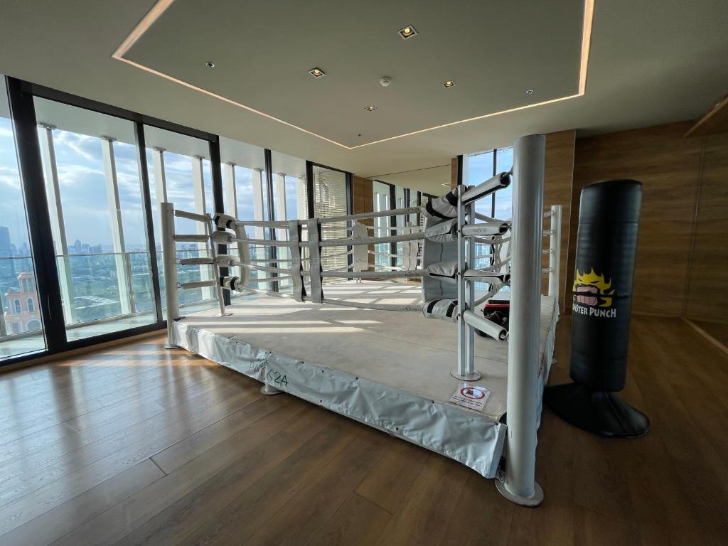a gym with a punching bag on the floor of a building at Luxurious Apartment in Sukhumvit in Bangkok