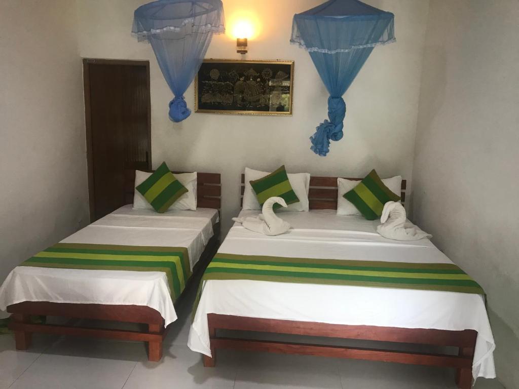 Postel nebo postele na pokoji v ubytování Rustle Hill Home Stay-Ella