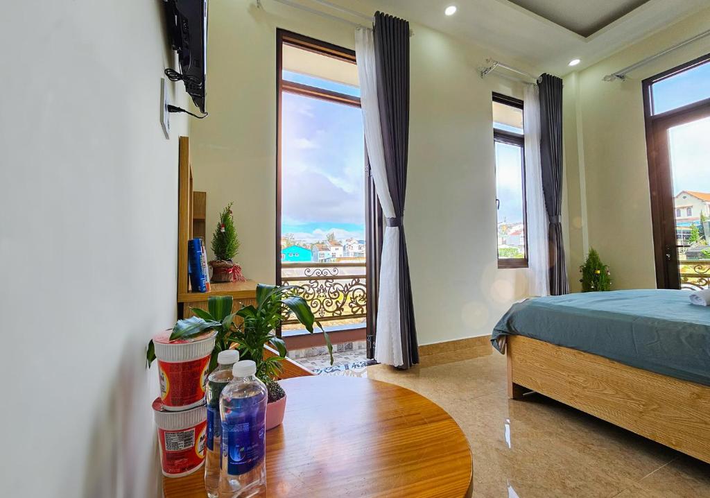 Giường trong phòng chung tại Mai DiaMond Hotel