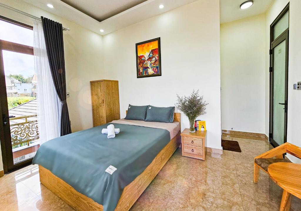 Giường trong phòng chung tại Mai DiaMond Hotel