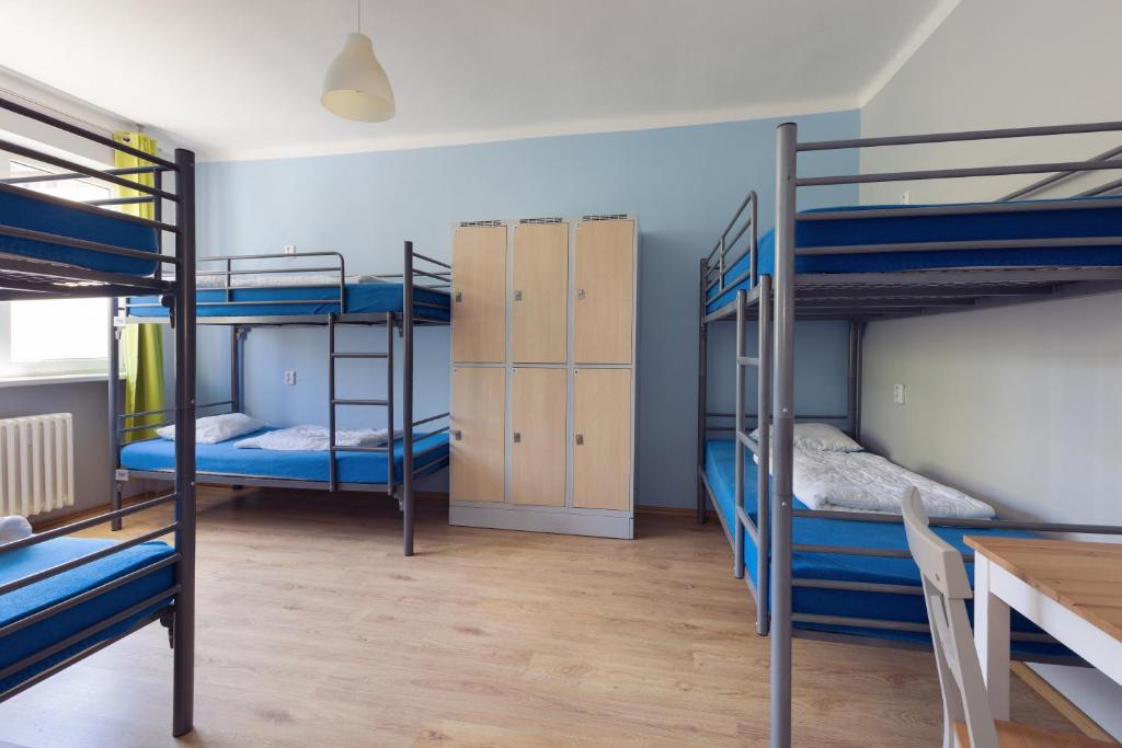Postel nebo postele na pokoji v ubytování Patio Hostel Dorms