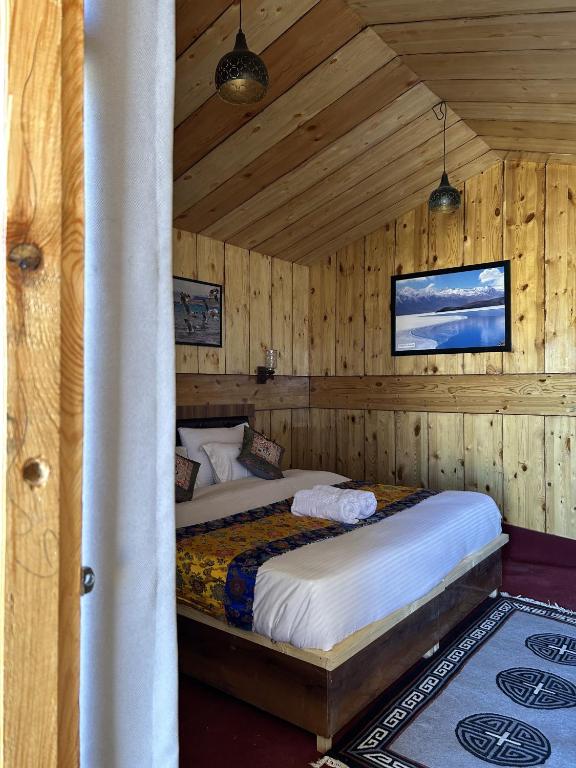 Postel nebo postele na pokoji v ubytování Pangong Pearl