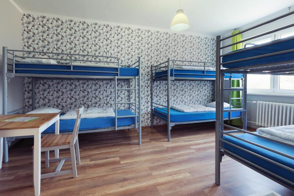 Postel nebo postele na pokoji v ubytování Patio Hostel Dorms