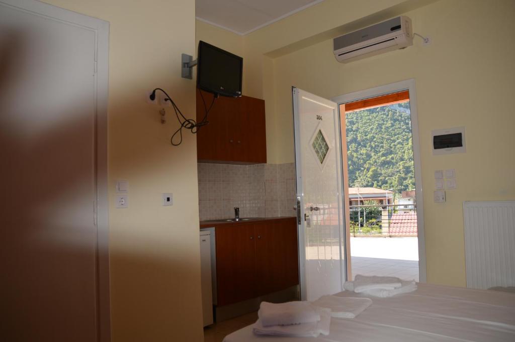 TV a/nebo společenská místnost v ubytování Marvi Hotel