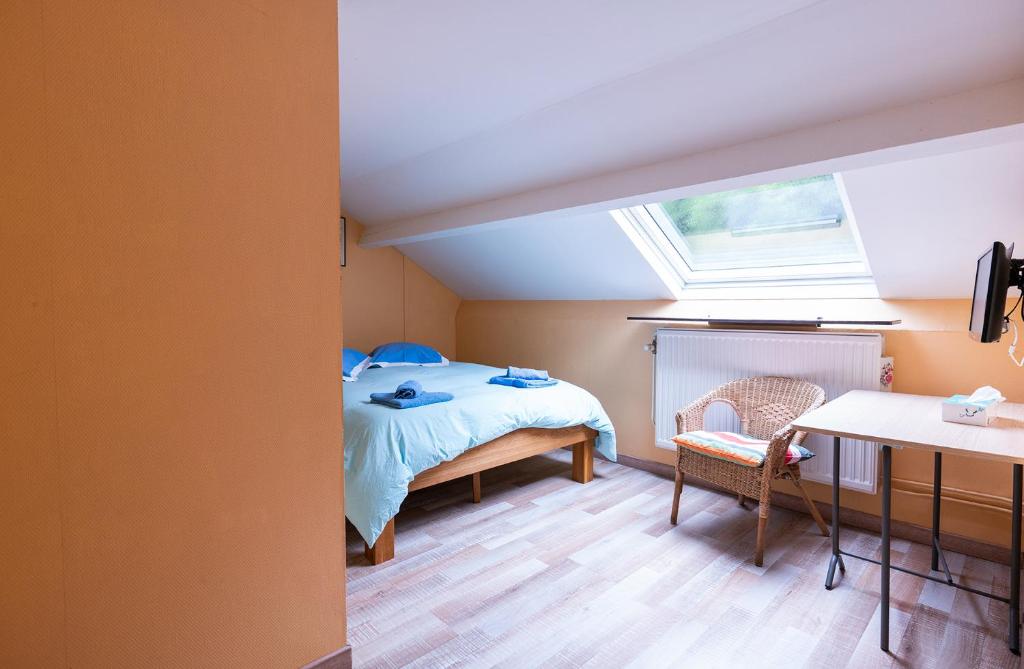 Postel nebo postele na pokoji v ubytování Orval16