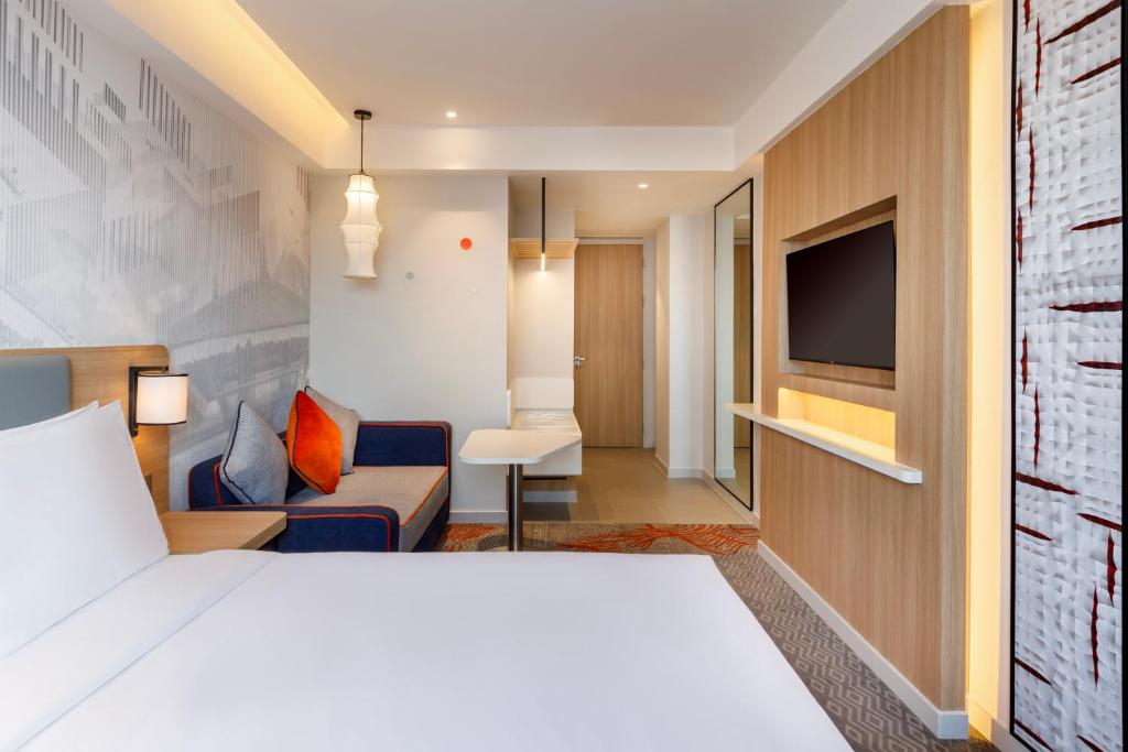 Postel nebo postele na pokoji v ubytování Holiday Inn Express Kathmandu Naxal by IHG