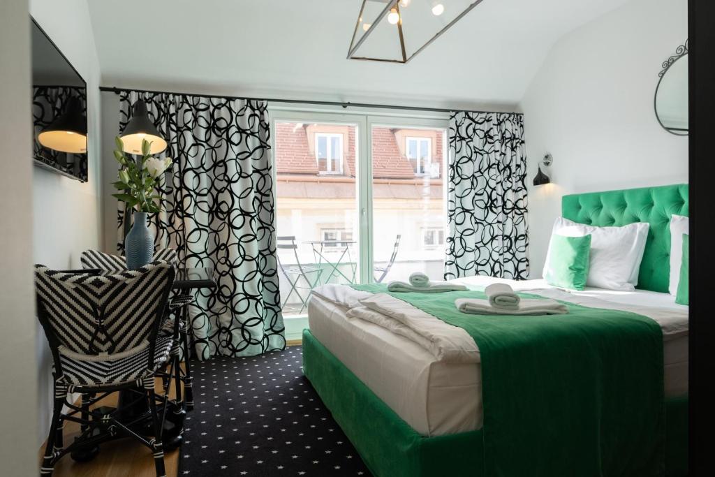 Letto o letti in una camera di City Stay Vienna – Lugeck