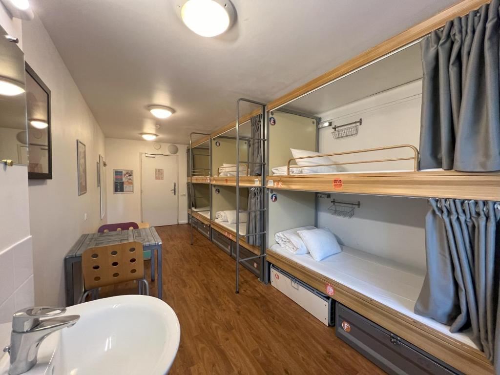 a bathroom with bunk beds and a sink at St Christopher's Inn Paris - Canal in Paris