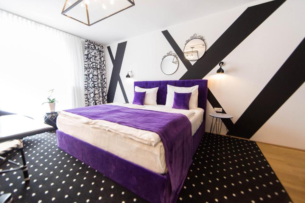 Letto o letti in una camera di City Stay Vienna – Lugeck