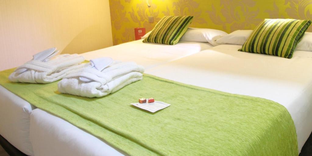 Postel nebo postele na pokoji v ubytování ELE Enara Boutique Hotel