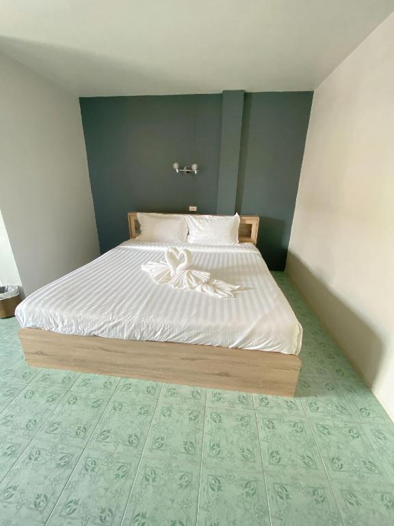 Postel nebo postele na pokoji v ubytování 2 Vikings Guesthouse