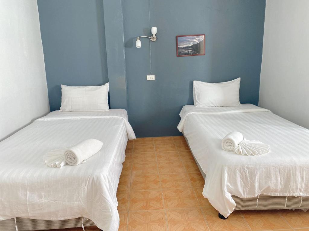 Postel nebo postele na pokoji v ubytování 2 Vikings Guesthouse