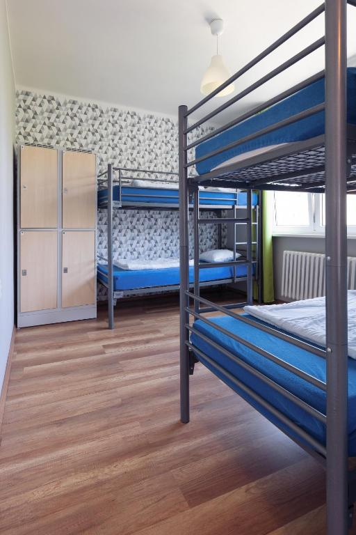 Postel nebo postele na pokoji v ubytování Patio Hostel Dorms