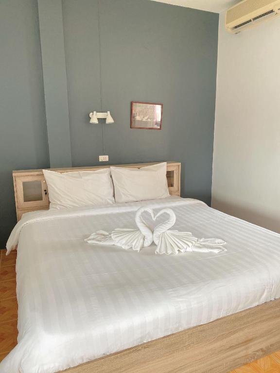 Postel nebo postele na pokoji v ubytování 2 Vikings Guesthouse