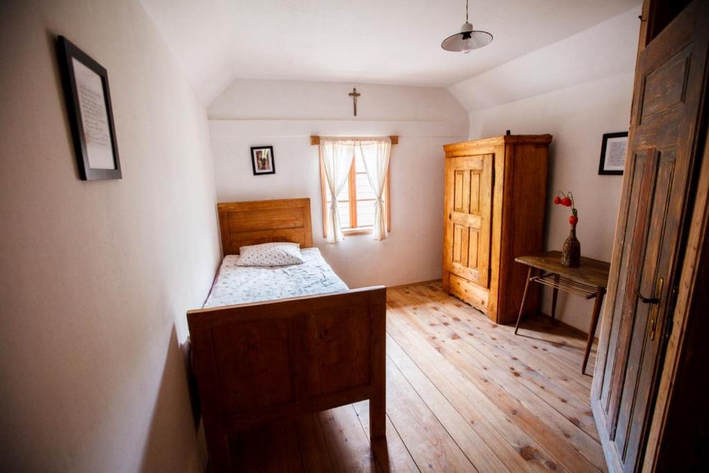 Postel nebo postele na pokoji v ubytování Kovačija pri Kovaču