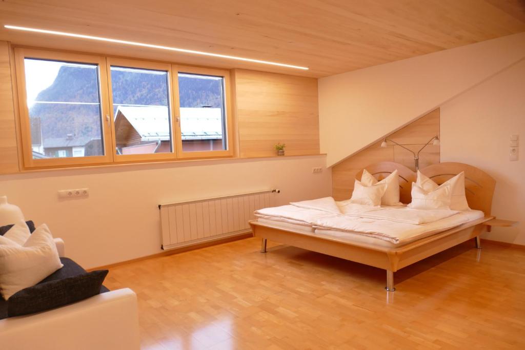 a bedroom with a bed in a room at Alpenferienwohnung Deluxe in Bürs