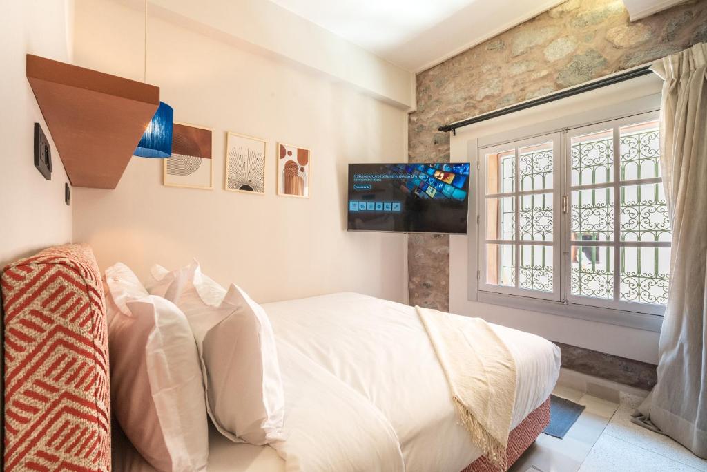 TV a/nebo společenská místnost v ubytování JEMAA EL FNA Suites & Spa