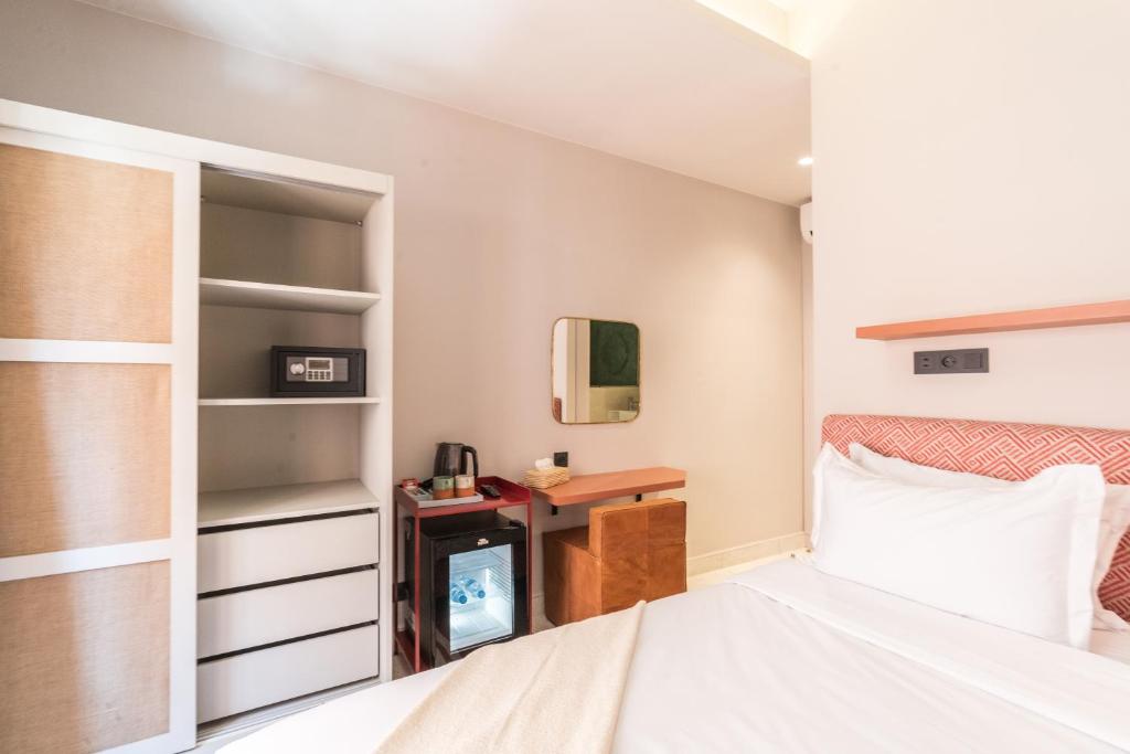 Postel nebo postele na pokoji v ubytování JEMAA EL FNA Suites & Spa