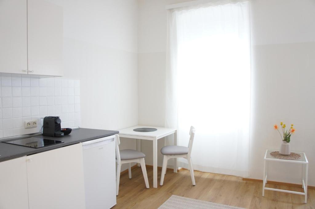 Kuchyňa alebo kuchynka v ubytovaní Schwarzacherhof Pension & Apartments