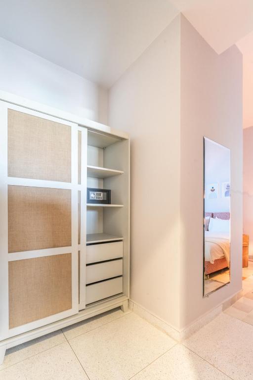 Postel nebo postele na pokoji v ubytování JEMAA EL FNA Suites & Spa
