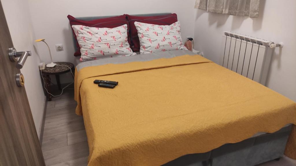 Posteľ alebo postele v izbe v ubytovaní APARTMENT NEVERA