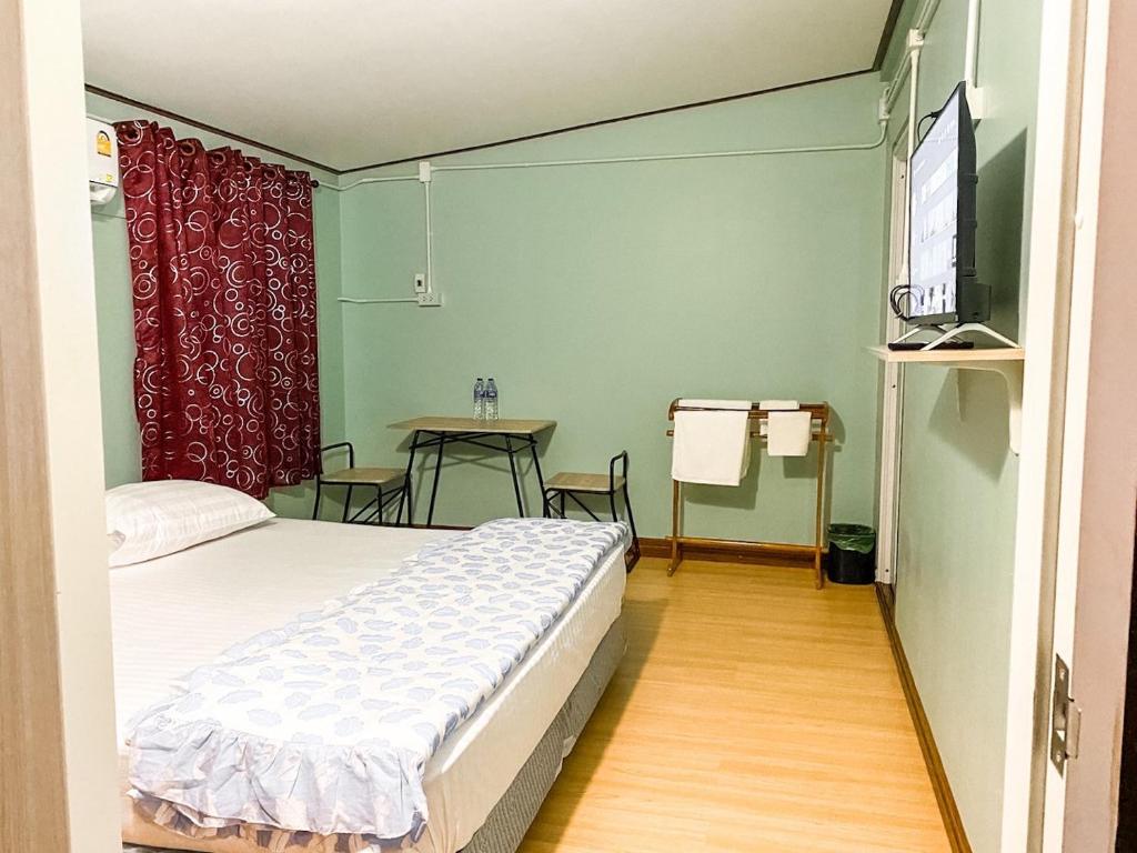 Postel nebo postele na pokoji v ubytování Baan Panmala Guesthouse - Ao Luek, Krabi